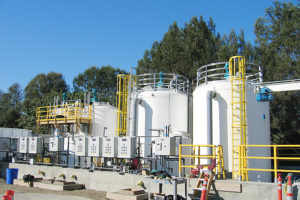 7,500 Gallon FRP Tanks with 2 hp Mixers Aluminum Access Ladders with Operator Safety Decks 